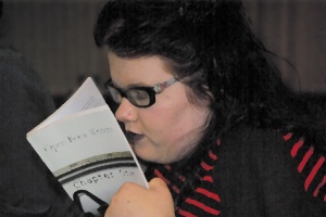 Georgina reading the first anthology